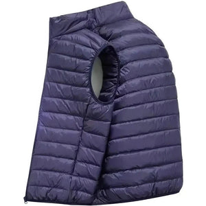 Doudoune sans Manche Homme Sport, coloris bleu marine, vue de profil sur fond blanc