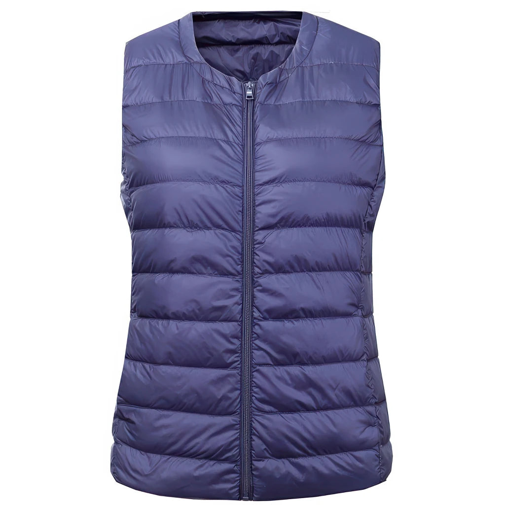Doudoune sans manche cintrée bleu marine, encolure ronde et zip, coupe près du corps