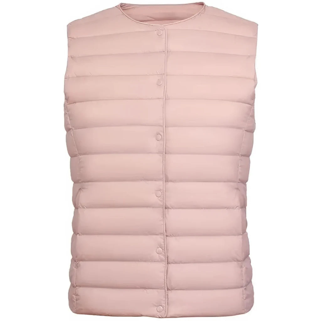 Doudoune sans manche femme violet en rose poudré, encolure ronde et boutonnage pression