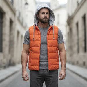 Doudoune sans manche homme orange portee, avec capuche en molleton gris
