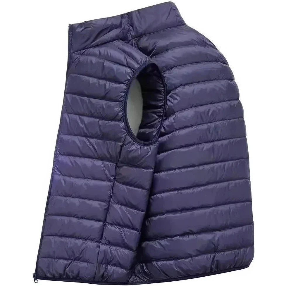 Doudoune sans Manche Homme Sport, coloris bleu marine, vue de profil sur fond blanc