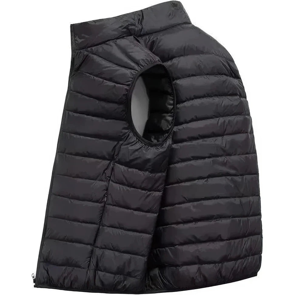 Doudoune sans Manche Homme Sport, coloris noir, vue de profil sur fond blanc