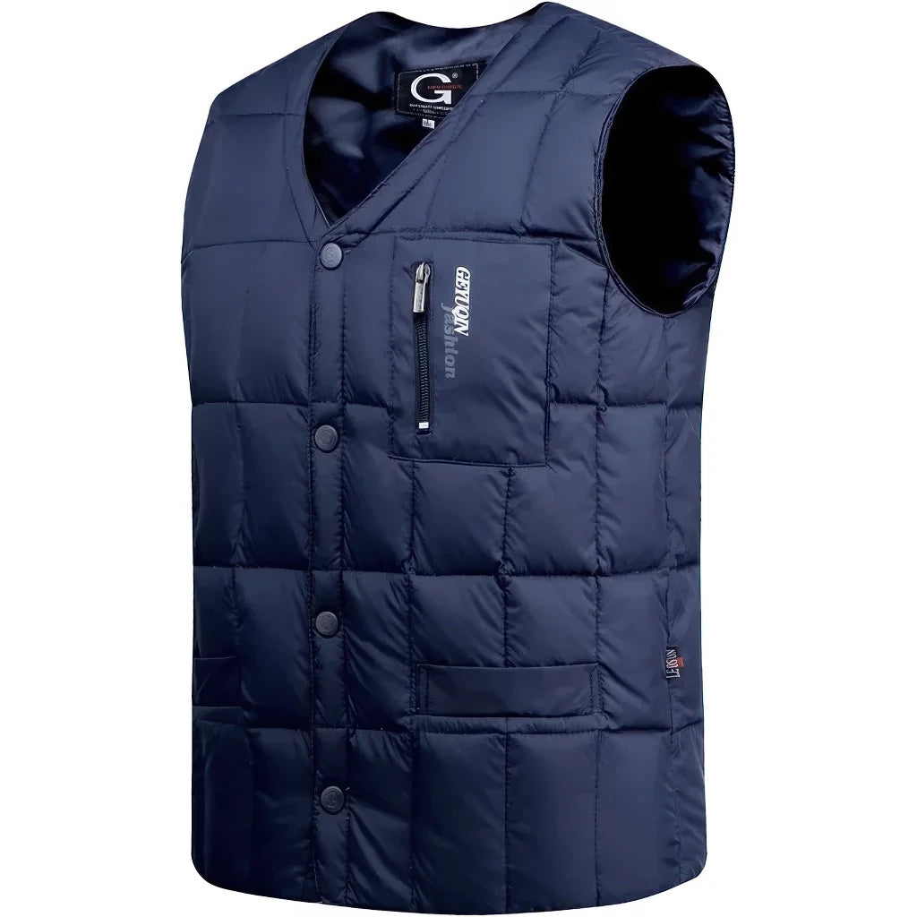 Doudoune sans Manche Plume Homme, coloris bleu marine, vue de trois quarts sur fond blanc
